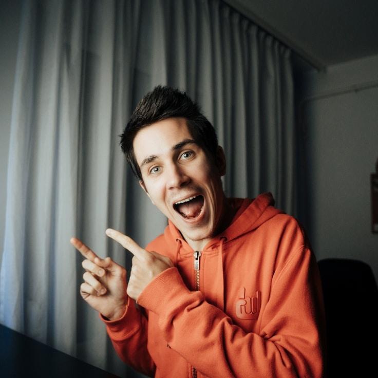 Kaveri Mehta, Lead Design Curator at Maple Crest Lumen, reviewing corporate floral arrangements